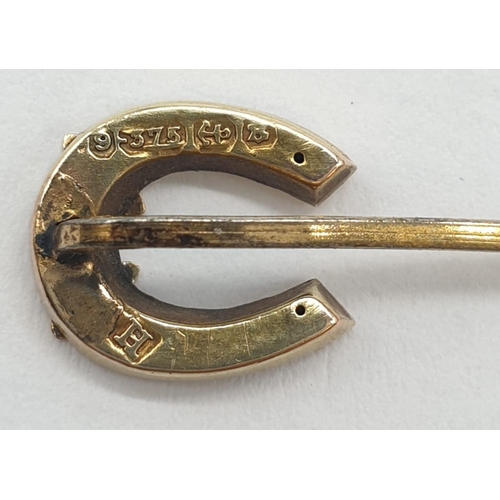 155 - a Victorian 9ct gold horseshoe stick pin 0.66g