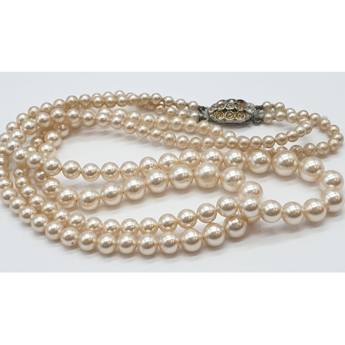 228 - Double strings of graduated pearl necklace, weight 41.8g and 40cm approx