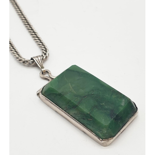 350 - Jade rectangular pendant on chain, weight 36.4g