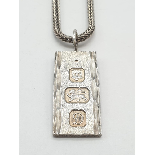 351 - Miniature silver ingot pendant on 38cm long silver chain, weight 12.1g