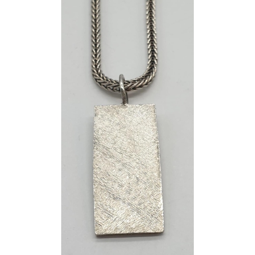 351 - Miniature silver ingot pendant on 38cm long silver chain, weight 12.1g