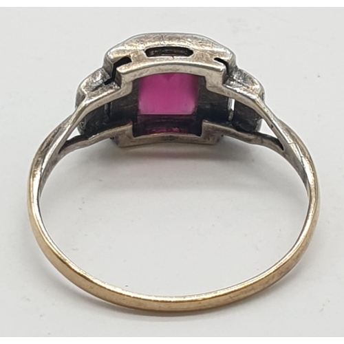 354 - 9ct gold and silver dress ring with pink stone, weight 2.1g and size P