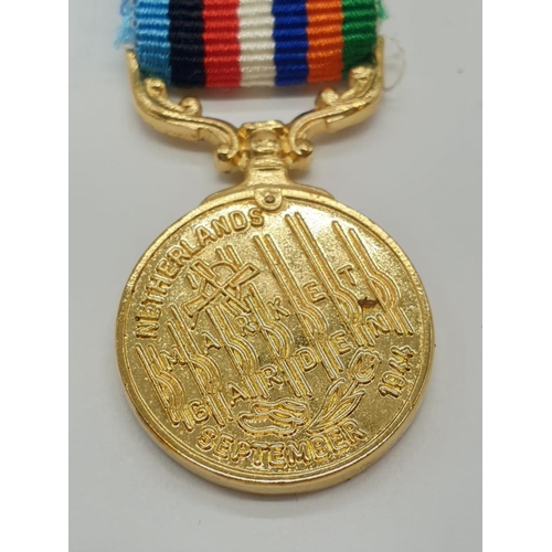 493 - Miniature medal dated 1944 for Market Garden Netherlands,