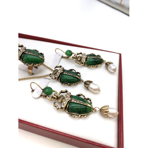 15 - A BELLE EPOQUE style scarabs with pearls jewellery set consisting of a ring, pendant (with chain) an... 