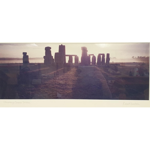 215 - Print of Stonehenge Summer solstice, personally owned and signed by Robert Davidson, 70 x 34cm appro... 