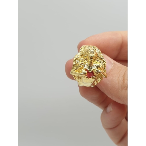 38 - An unusual silver (stamped 925) and gold filled ring depicting a lady offering her heart. Ring size:... 