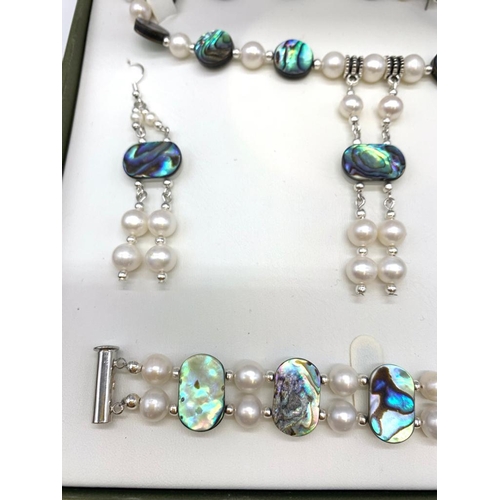 39 - A mid-seventies, Australian pearl and Abalone mother of pearl necklace, bracelet and earrings set, i... 