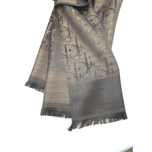 5 - A high quality, large, Cashmere and silk shawl, with the inscription CHRISTIAN DIOR and DIOR woven i... 