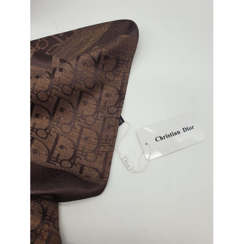 5 - A high quality, large, Cashmere and silk shawl, with the inscription CHRISTIAN DIOR and DIOR woven i... 