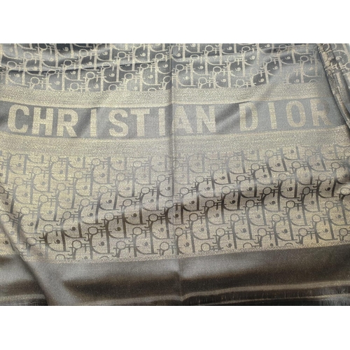 5 - A high quality, large, Cashmere and silk shawl, with the inscription CHRISTIAN DIOR and DIOR woven i... 