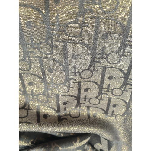 5 - A high quality, large, Cashmere and silk shawl, with the inscription CHRISTIAN DIOR and DIOR woven i... 