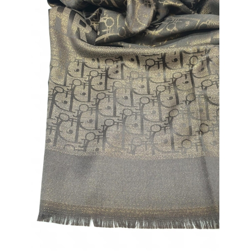 5 - A high quality, large, Cashmere and silk shawl, with the inscription CHRISTIAN DIOR and DIOR woven i... 