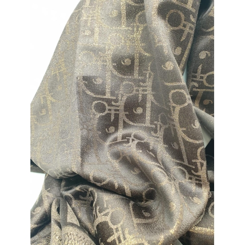 5 - A high quality, large, Cashmere and silk shawl, with the inscription CHRISTIAN DIOR and DIOR woven i... 