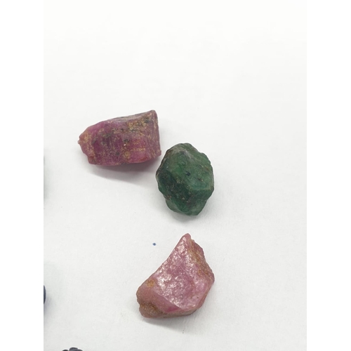 288 - 47cts Ruby emerald blue sapphire rough cut gems lot. Pink, Green and Blue colours.