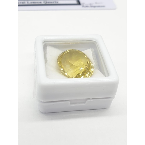 455 - 19.30 Cts Natural lemon quartz. Oval mixed cut stone. GLI certification included.