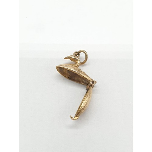 247 - Two 9ct gold charms/pendants of 2 swans. One opens up to show ballerina dancing inside. Length 1cm. ... 