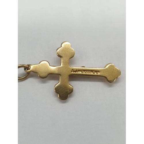 268 - 9ct gold 'Jesus on Cross' pendant. Length 2.5cm. Weight 0.83g