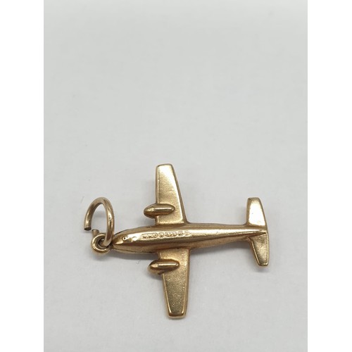 317 - Two 9ct gold pendants. An anchor and Spitfire inspired airplane. Plane length is 2cm. Combined weigh... 