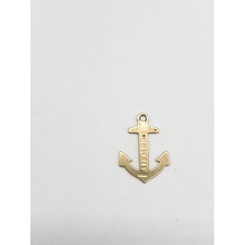 317 - Two 9ct gold pendants. An anchor and Spitfire inspired airplane. Plane length is 2cm. Combined weigh... 