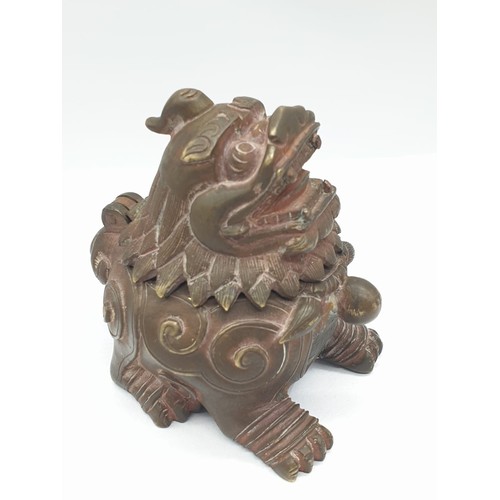 164 - A Brass Dragon Inkwell. 7cm High