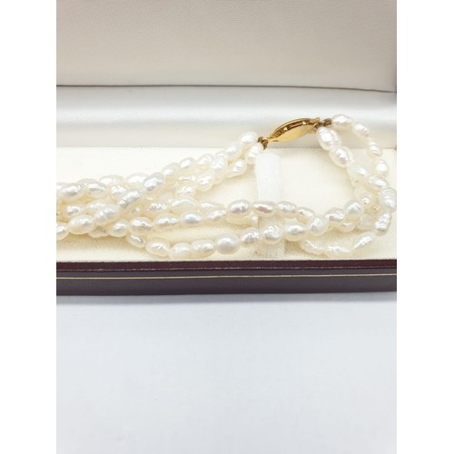 347 - Triple twisted strings of pearl necklace, 42cm long approx