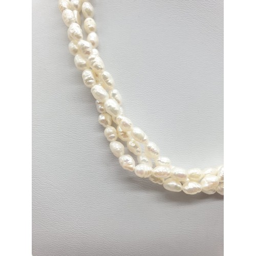 347 - Triple twisted strings of pearl necklace, 42cm long approx