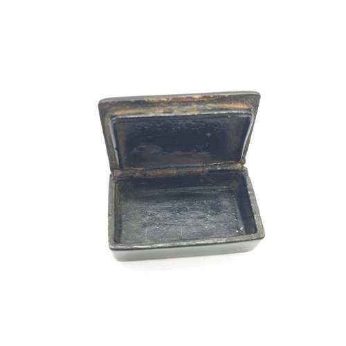 179 - Two antique tiny snuff boxes. Made from lacquered papier mache, hinged lid with pewter inlay.