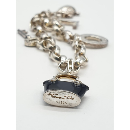 126 - Silver Thomas Sabo Bracelet with Charms. All charms are silver having Thomas Sabo markings. 7.5 inch... 