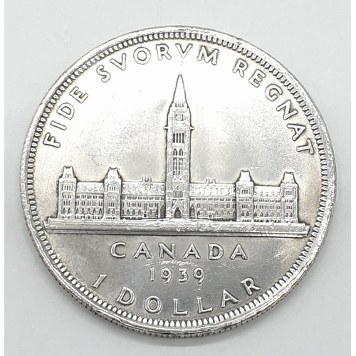 320 - Silver George V1 1939 Canadian 'Ottawa' dollar. Clear and raised definition to both sides. Small sca... 