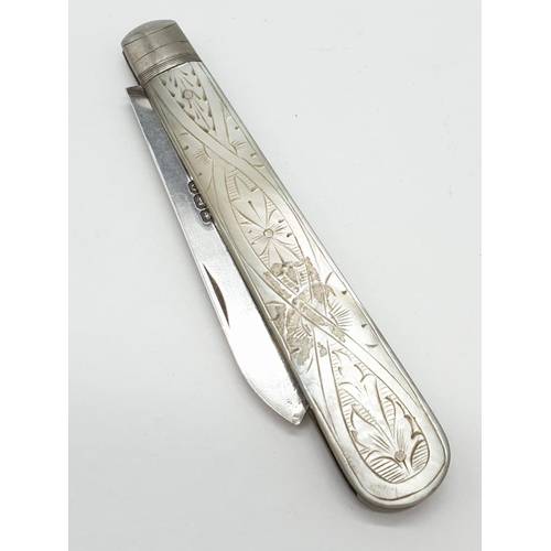 321 - Silver bladed fruit knife having mother of pearl handle with intricate carving. Full hallmark for Wi... 