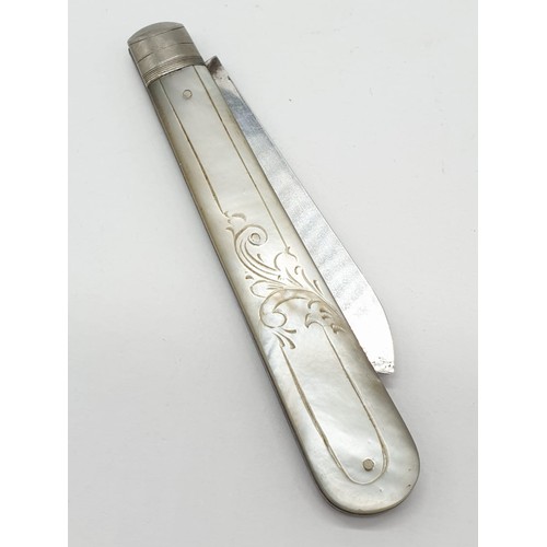 321 - Silver bladed fruit knife having mother of pearl handle with intricate carving. Full hallmark for Wi... 