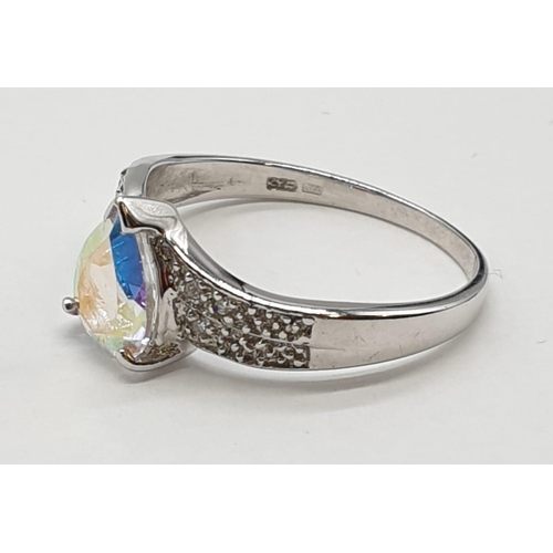 104 - 9ct white gold mystic topaz and diamond ring. Size M, Weight 2.24 grams.