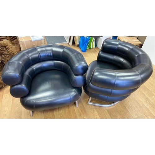 129 - 2 x Elieen Gray Bibendum vintage black leather armchairs. Very stylish and comfy and in  good condit... 