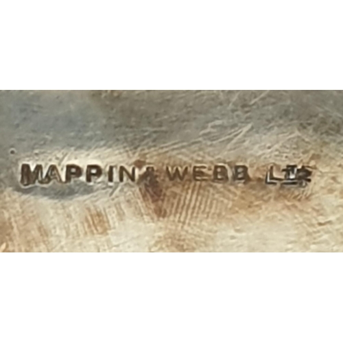 142 - Mappin and Webb silver plated wine bottle holder. 15cm x 13.5cm.