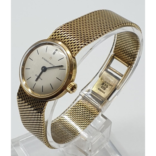 209 - 9ct yellow gold vintage EternaMatic ladies watch with 9ct gold strap, weight 32.7g