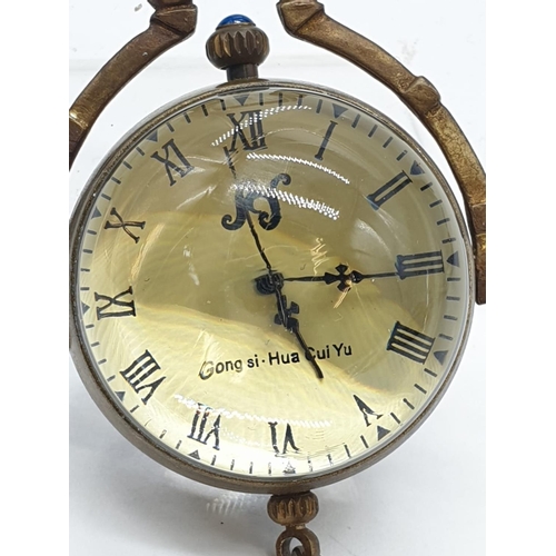 249 - Chinese vintage brass pocket ball clock exhibition back (manual wind)