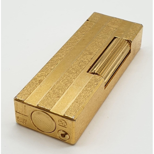 250 - Gold plated Dunhill lighter, 6.5cm long approx in good condition