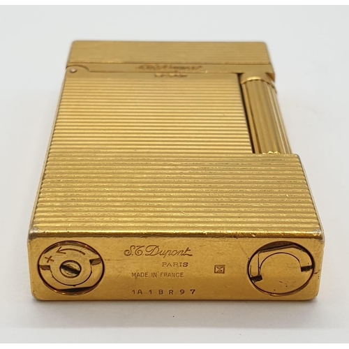 251 - A vintage gold plated ST. Dupont lighter. Needs new flint and gas.