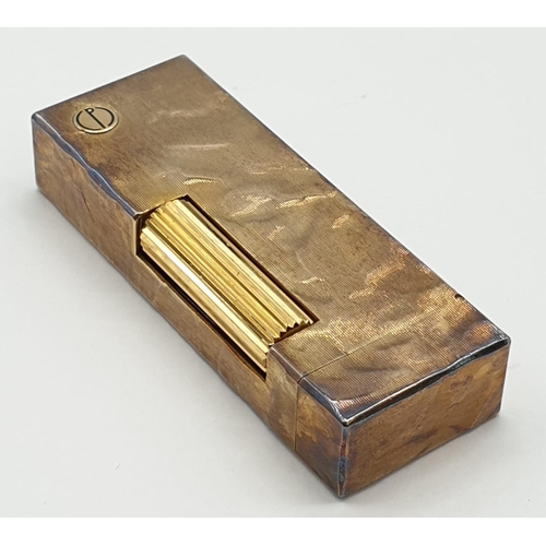 258 - Dunhill mottled gold finished lighter, needs cleaning