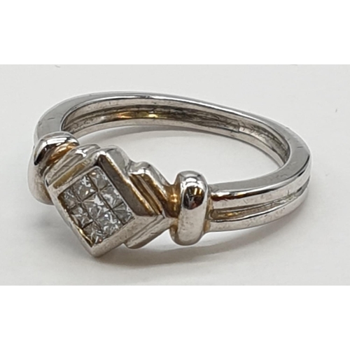 315 - 9ct white gold ring with 0.20ct diamonds. Size K1/2, weight 3.54 grams.