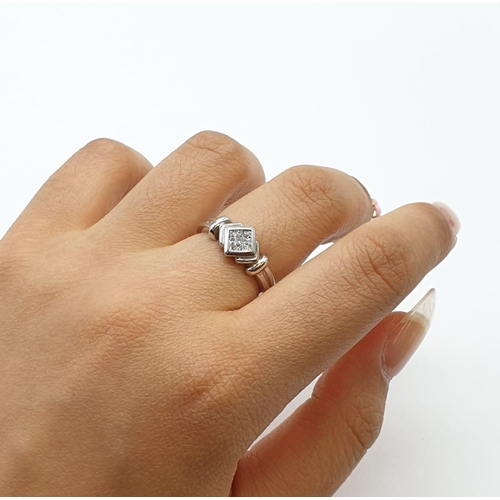 315 - 9ct white gold ring with 0.20ct diamonds. Size K1/2, weight 3.54 grams.