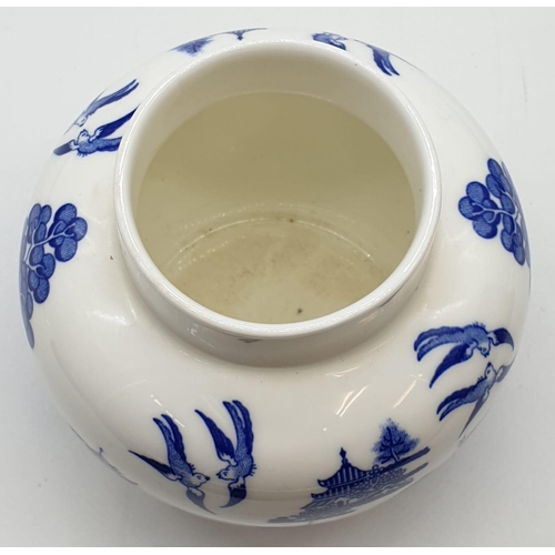 335 - Blue and white Coalport 'Willow' tea jar. Height 11cm in height.