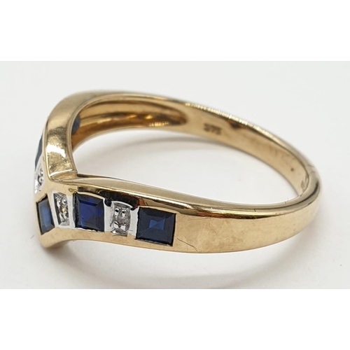 336 - 9ct gold wishbone ring with 5 sapphires and 4 small diamonds. Size O. Weight 2.47 grams.