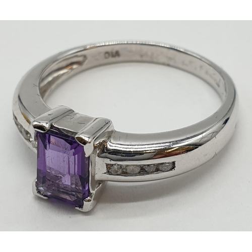 339 - 9ct white gold emerald cut amethyst and diamond ring. Size O. Weight 3.45 grams