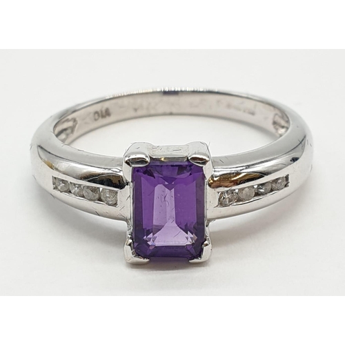 339 - 9ct white gold emerald cut amethyst and diamond ring. Size O. Weight 3.45 grams