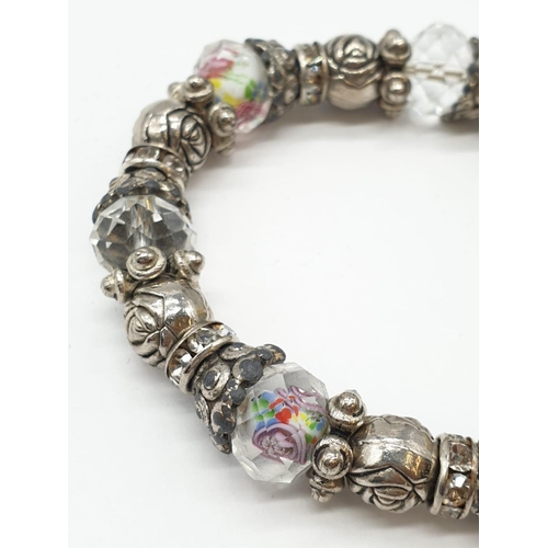 391 - Link of London charm bracelet, weight 53.9g in original box (AF)