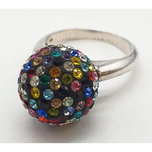 397 - Unusual silver ring having coloured glitter ball to top. Marking for 925 silver. Size O 1/2 - P.