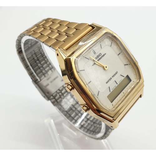 408 - Vintage Cassio wristwatch Illuminator AQ231. New and unused on jewellers Casio display stand. Gold t... 