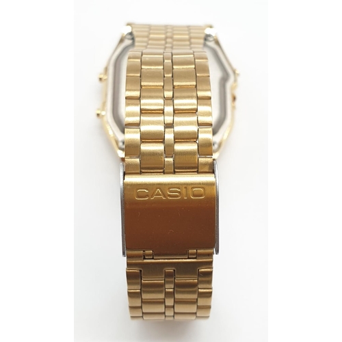 408 - Vintage Cassio wristwatch Illuminator AQ231. New and unused on jewellers Casio display stand. Gold t... 