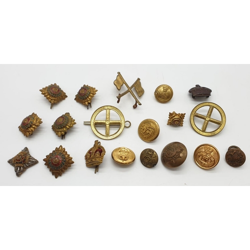 412 - Selection of military brass to include buttons, shoulder pips, crossed flag, signal lens badge, etc.